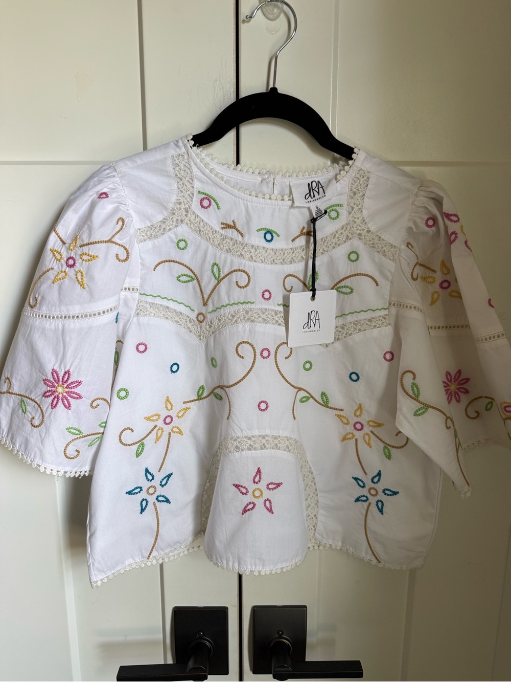 DRA NWT Embroidered Peasant Blouse with Multicolor Floral Accents, size S.